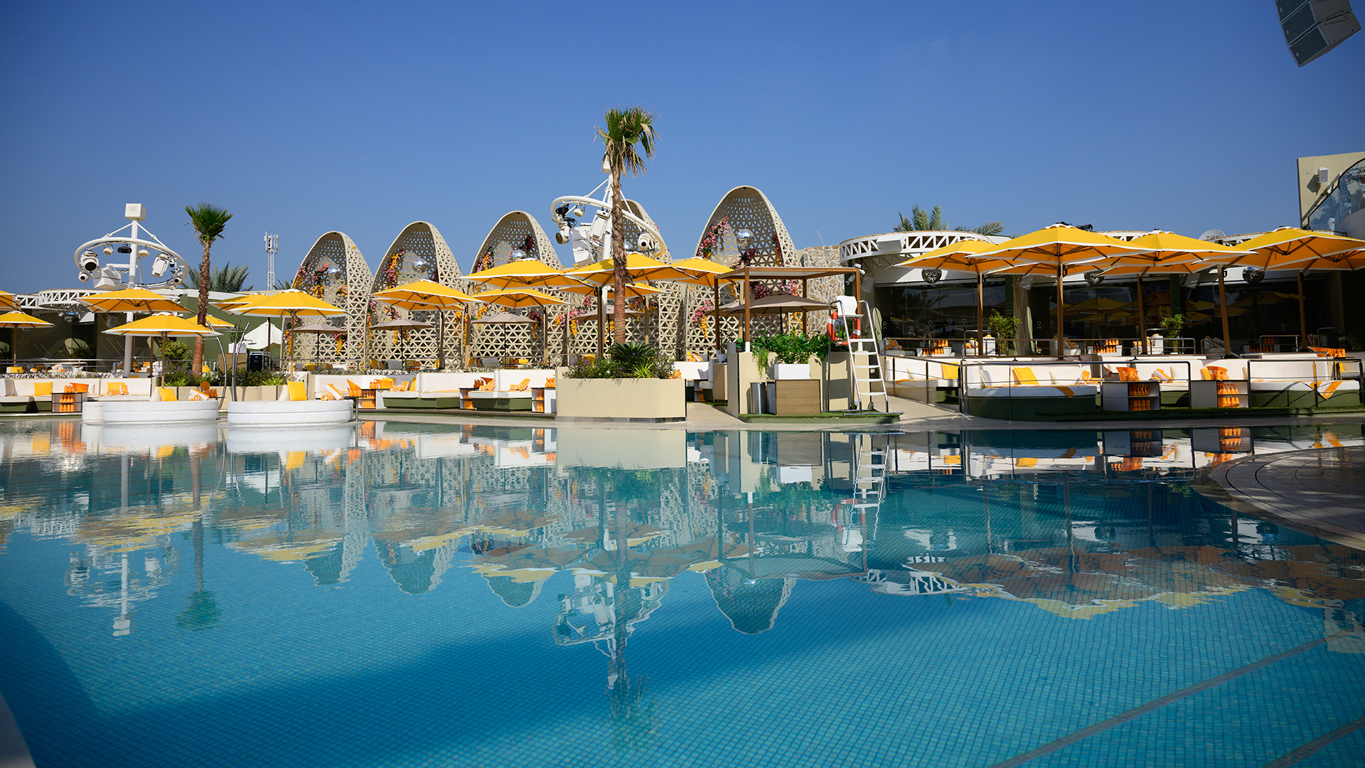 O Beach Dubai beach club construction, structural, civil, fit-out and MEP works featuring luxury pool areas, VIP cabanas, beach lounges, dining spaces, and hospitality interiors