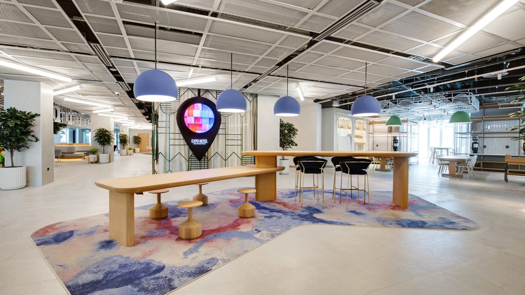 Rove Expo City Dubai hotel interior fit-out and MEP works featuring modern guest rooms, creative lounge, co-working spaces and pool overlooking Al Wasl Dome